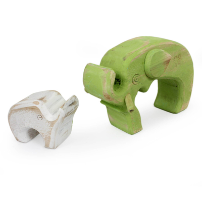 Wood sculpture, 'Green Elephant Family' (pair) - Hand Crafted Green and White Wood Elephant Sculptures (Pair)
