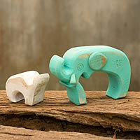 Wood sculpture, 'Aqua Elephant Family' (pair) - Thai Aqua and White Wood Elephant Sculptures (Pair)