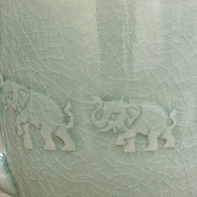 Celadon ceramic mug, 'Blue Elephant Walk' - Light Blue Elephant Theme Celadon Ceramic Mug
