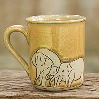 Celadon ceramic mug, 'Yellow Elephant Family'