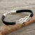 Leather pendant bracelet, 'Infinite Wonder' - Thai Sterling Silver and Hand Knotted Leather Bracelet (image 2) thumbail