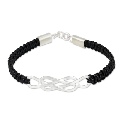 Leather pendant bracelet, 'Infinite Wonder' - Thai Sterling Silver and Hand Knotted Leather Bracelet