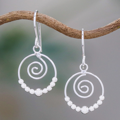 Sterling silver dangle earrings, 'Whirl' - Handcrafted Sterling Silver Dangle Earrings with Spirals