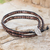 Quartz and leather wrap bracelet, 'Hill Tribe Lands in Black' - Hand Crafted Black Leather Bracelet with Brown Quartz Beads thumbail