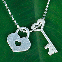 Sterling silver pendant necklace, 'Key of Love' - Handcrafted Silver Heart  Lock and Key Pendant Necklace