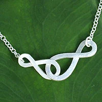 Sterling silver pendant necklace, 'Into Infinity' - A Necklace Made from Linked Silver Symbols