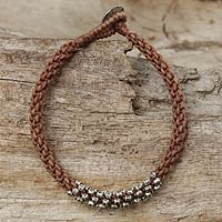 Silver beaded cord bracelet, 'Tribal Flowers in Tan' - Handwoven Cord Bracelet in Tan with Silver Beads