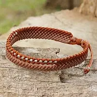 Silver beaded wristband bracelet, 'Amity in Copper and Tan' - Beaded Rust and Tan Cord Bracelet from Thai Artisan