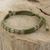 Kordelarmband aus silbernen Perlen - Geflochtenes Armband aus grünem Kordel, handgefertigt in Thailand