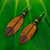Leather and bone dangle earrings, 'Brown Feather' - Feather-Shaped Earrings Crafted from Leather, Bone and Wood thumbail