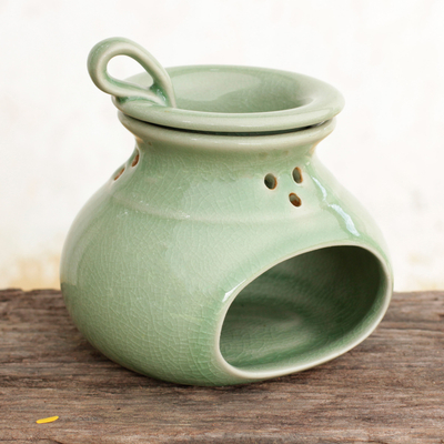 Celadon ceramic oil warmer, 'In Harmony' - Green Celadon Ceramic Oil Warmer from Thailand