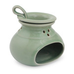 Celadon ceramic oil warmer, 'In Harmony' - Green Celadon Ceramic Oil Warmer from Thailand