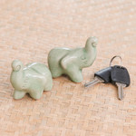 Celadon ceramic figurines, 'Lucky Green Elephants' (pair) - 2 Green Celadon Ceramic Handcrafted Lucky Elephant Figurines