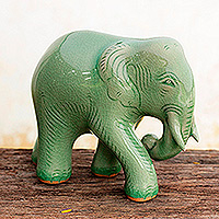 Featured review for Celadon ceramic figurine, Purposeful Elephant