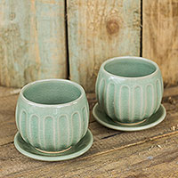 Celadon ceramic teacups and saucers, 'Thai Jade' (pair)