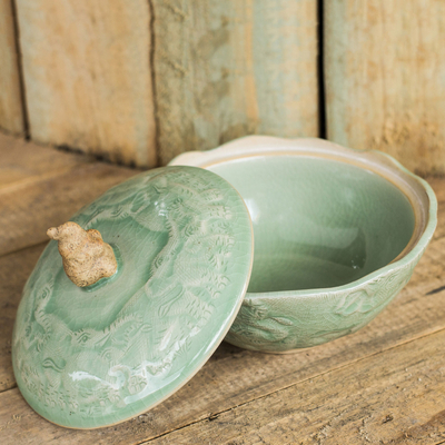 Celadon ceramic lidded bowl, 'Sawasdee' - Handcrafted Green Ceramic Bowl and Lid with Elephant Motif