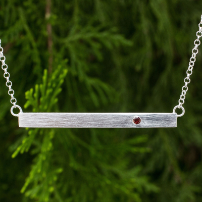 Garnet bar pendant necklace, 'Simple Devotion' - Brushed Sterling Silver and Garnet Pendant Necklace