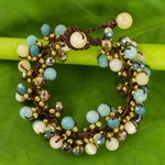 Beaded bracelet, 'Azure Cattlelaya' - Yellow and Blue Quartz Beaded Bracelet Knotted by Hand