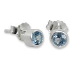Blue topaz stud earrings, 'Light' - Sterling Silver Stud Earrings with Faceted Blue Topaz