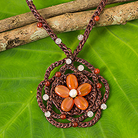 Carnelian beaded pendant necklace, 'Earth Flower' - Carnelian Flower Necklace on Hand Crocheted Cords