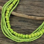 Wood beaded necklace, 'Oasis Dance' - Long Multi Strand Bright Green Beaded Wood Necklace
