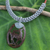 Leather and coconut shell pendant necklace, 'Happy Deer in Grey' - Coconut Shell Pendant on Hand Crafted Leather Necklace