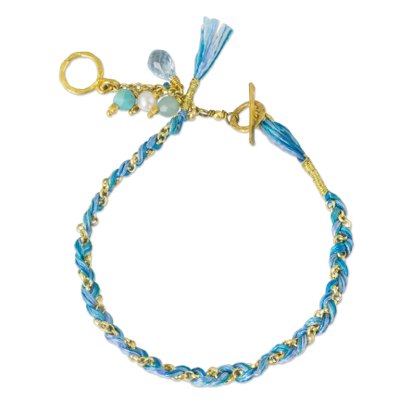 Gold plated multi-gemstone braided bracelet, 'Blue is for Peace' - Blue Theme Gold Plated Cotton Bracelet and Multi Gem Charms