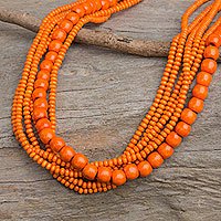 Wood beaded necklace, 'Solar Dance' - Orange Wood Bead Necklace Hand Crafted in Thailand