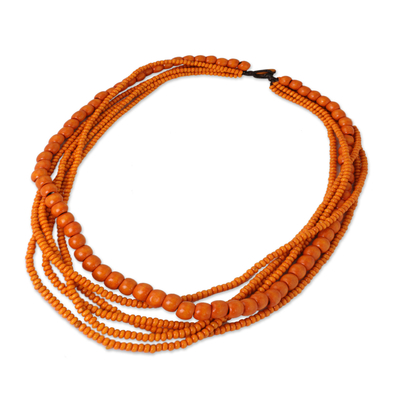 Wood beaded necklace, 'Solar Dance' - Orange Wood Bead Necklace Hand Crafted in Thailand