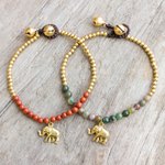 Jasper beaded bracelets, 'Stylish Elephants' (pair) - Jasper and Elephant Charm on Pair of Brass Beaded Bracelets