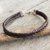 Braided leather bracelet, 'Assertive in Brown' - Thai Brown Leather Braided Bracelet with Silver Clasp thumbail