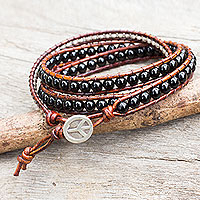 Onyx wrap bracelet, 'Hill Tribe Boheme' - Onyx Beads on Brown Leather Wrap Bracelet from Thailand