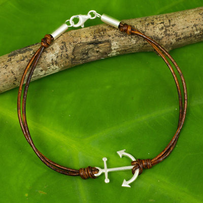 Leather and sterling silver bracelet, 'Anchor of Strength' - Fair Trade Brown Leather Bracelet with Silver Anchor