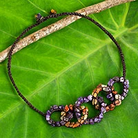 Amethyst and carnelian necklace, 'Chain Reaction' - Amethyst and Carnelian Gemstone Necklace on Brown Cords