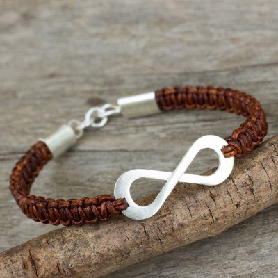Leather and sterling silver bracelet, 'Infinite Joy in Brown' - Infinity Symbol Pendant Bracelet on Brown Leather Macrame