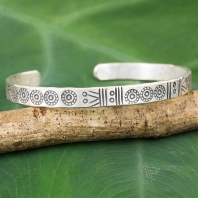 Silver cuff bracelet, 'Ancestral Symbols' - Thailand Karen Hill Tribe Stamped Cuff Bracelet in Silver