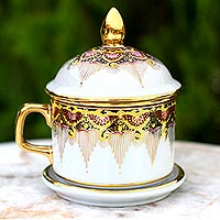 Benjarong porcelain teacup, 'Thai Iyara' - Benjarong White Elephant Teacup and Lid with Gold Paint