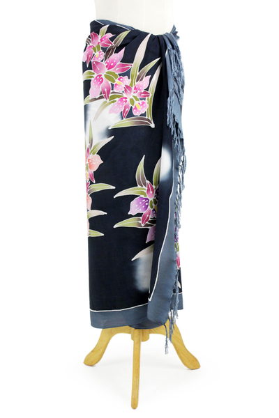 Rayon batik sarong, 'Luminous Orchids' - Artisan Crafted Black Rayon Sarong with Floral Motif