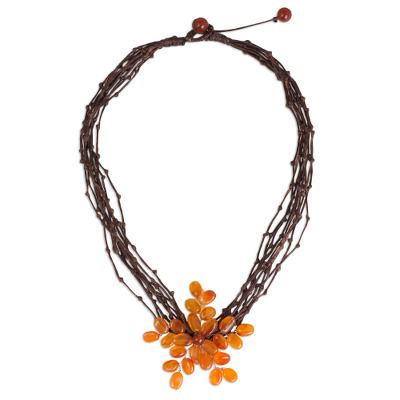 Carnelian beaded pendant necklace, 'Twigs and Flowers' - Carnelian Flower Pendant Necklace on Brown Cords