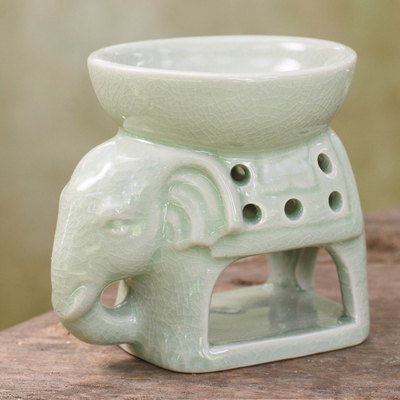Ceramic oil warmer, 'Sunshine Elephant' - Thailand Ceramic Clay Green Elephant Oil Warmer Hand Crafted