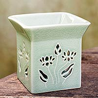 Ceramic clay oil warmer, 'Lotus Garden' - Floral Ceramic Clay Tealight Oil Warmer Handcrafted Thailand