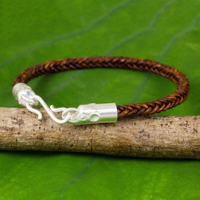 Braided leather bracelet, 'Elephant Promise in Brown' - Hand Crafted Leather Braided Bracelet with Elephant Motif