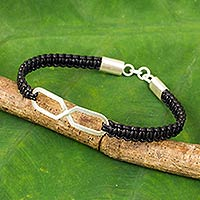 Leather and sterling silver bracelet, 'Infinite Friendship in Black' - Infinity Symbol Pendant Bracelet on Black Leather Wristband