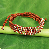 Silver accent wristband bracelet, 'Ginger Chiang Mai Quartet - Ginger-Orange Macrame Bracelet with Hill Tribe Silver Beads