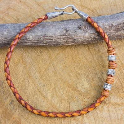 Men's braided leather bracelet, 'Walk the Russet Path' - Men's Braided Leather Bracelet with Hill Tribe Silver