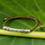 Sterling silver pendant bracelet, 'Infinite Legend in Olive' - Sterling Silver Accent Bracelet from Thailand