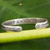 Sterling silver cuff bracelet, 'Find Peace' - Floral Sterling Silver Peace Bracelet from Thailand