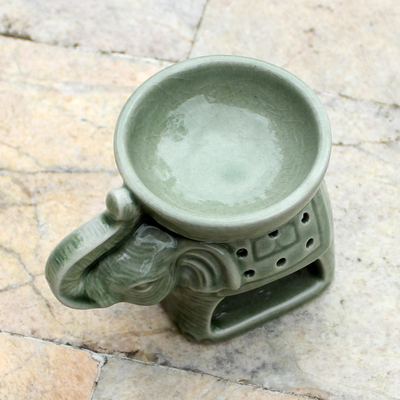 Ceramic oil warmer, 'Welcome Elephant' - Green Ceramic Clay Elephant Oil Warmer from Thailand