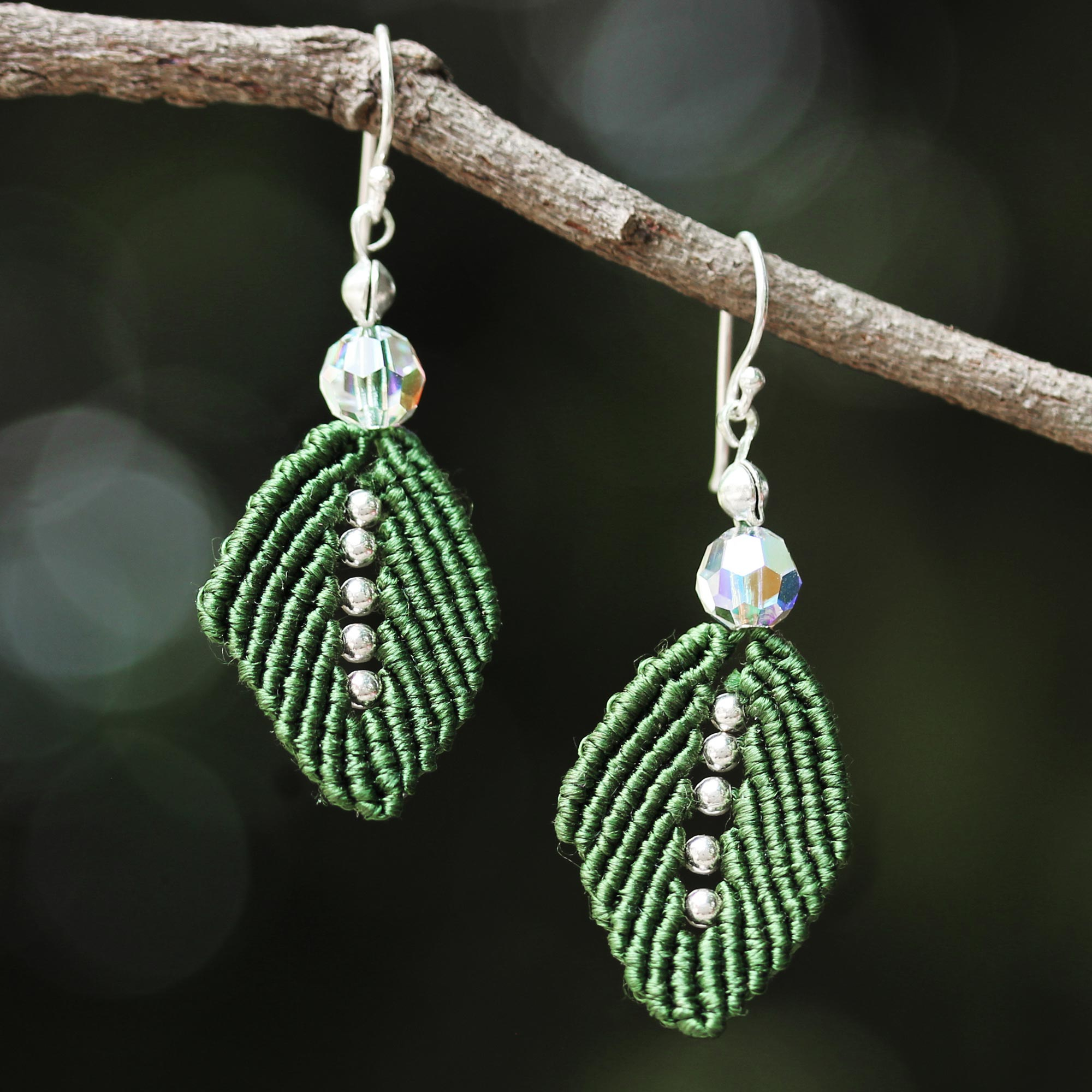 Silver dangle earring with green beads