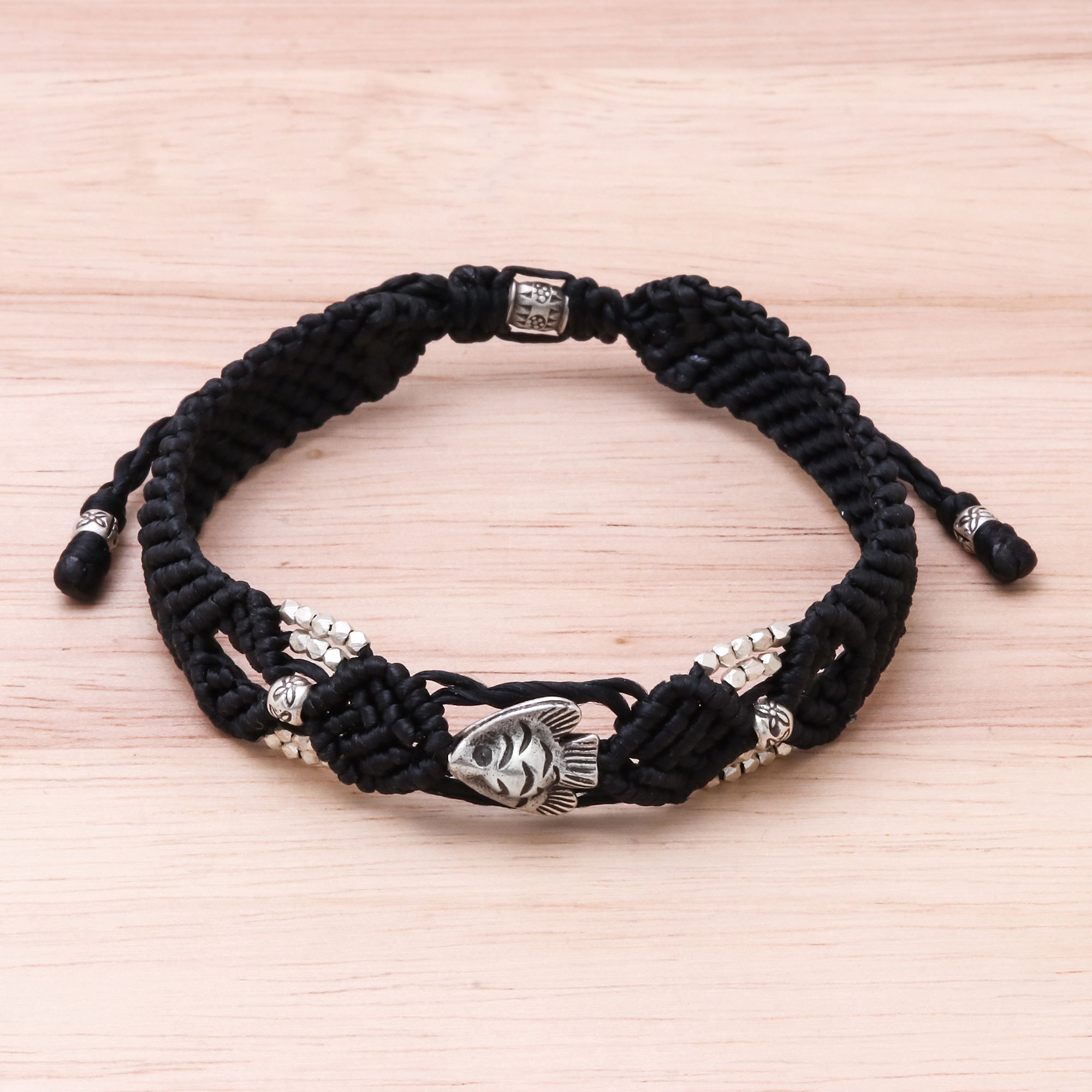 Short black beads and braided wire necklace.